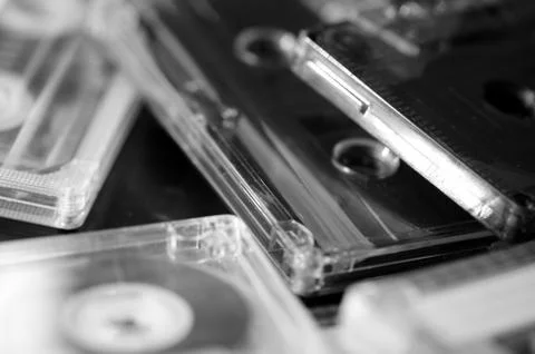 A stack of old audio cassettes. Black and White Stock Photos
