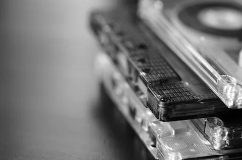 A stack of old audio cassettes. Black and White 写真素材