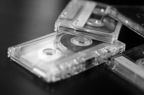 A stack of old audio cassettes. Black and White Stock Photos