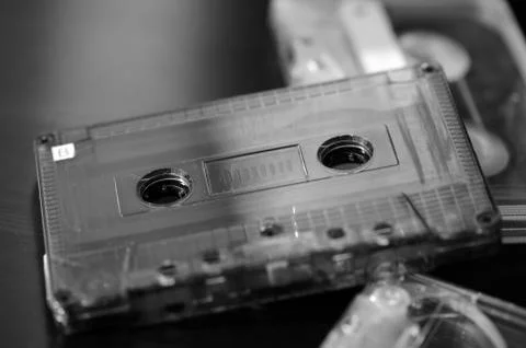 A stack of old audio cassettes. Black and White Stock Photos
