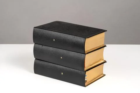Stack of Old Black Books with Bookmarks Stock Photos