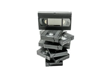 A stack of old black VHS tapes イラスト素材