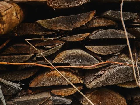 A stack of old boards lying outdoors near the barn. wood texture 스톡 사진