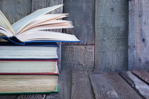 Stack of old books and on a table 写真素材