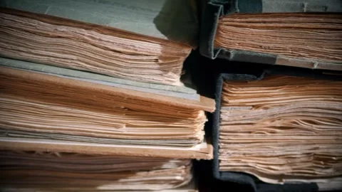 Stack of old books in an archive – sliding camera view Stock Footage 347013560