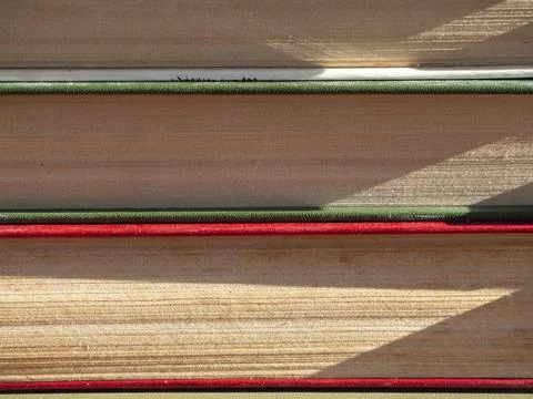 A stack of old books for the background. Abstract background with horizontal  스톡 사진