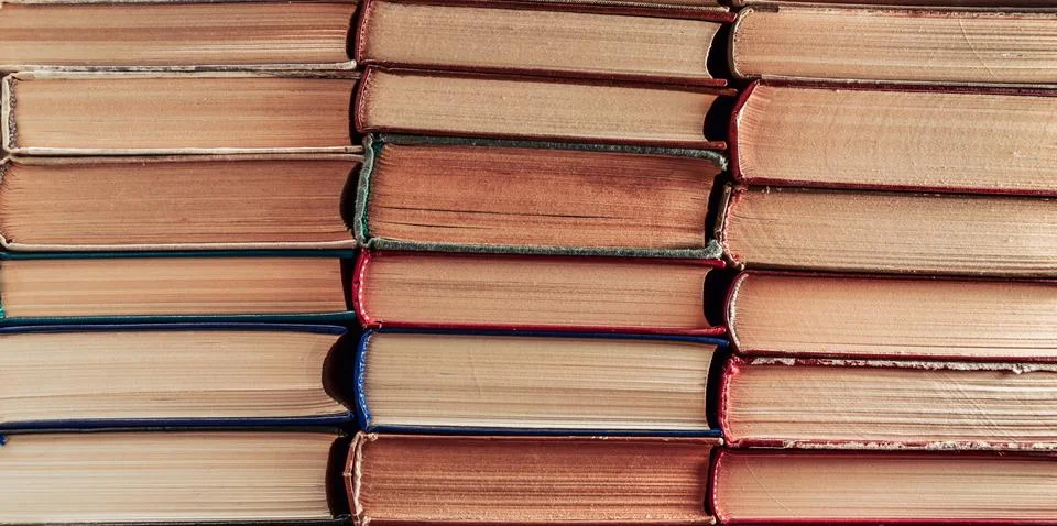 Stack of old books background Stock Photos