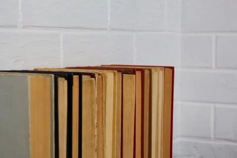 A stack of old books. Bookstore, library, bookshelf. Vintage, retro, antique. 스톡 사진