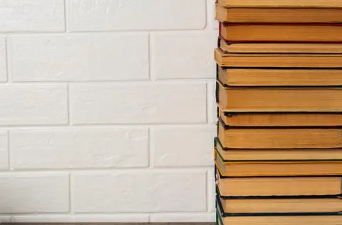 A stack of old books. Bookstore, library, bookshelf. Vintage, retro, antique. Foto stock