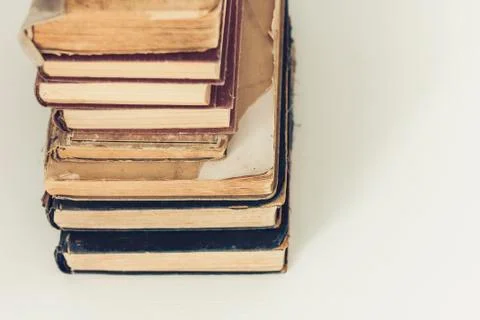 Stack of old books education retro concept background, many books piles with  Stock Photos