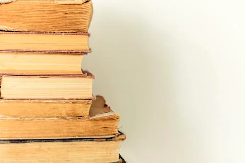 Stack of old books education retro concept background, many books piles with  Stock Photos