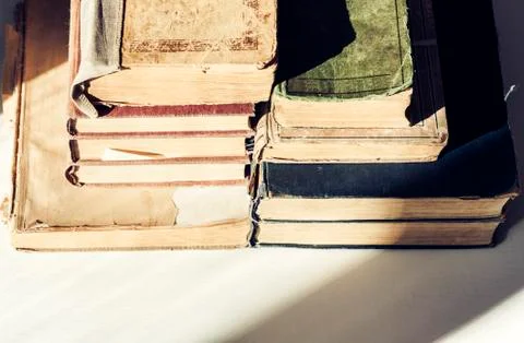 Stack of old books education retro concept background, many books piles with  Stock Photos