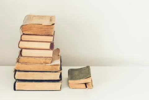 Stack of old books education retro concept background, many books piles with  Stock Photos