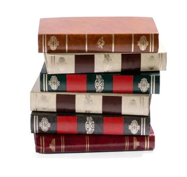Stack of old books with gilt tooled spines Stock Photos