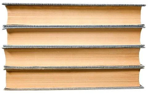 Stack of old books isolated on a white background. View from the end. Stock Photos