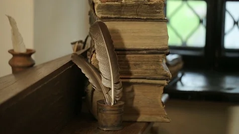 Stack of old books in library Video stock 75426020