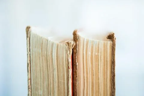 Stack of old books on light background, close up Stock Photos