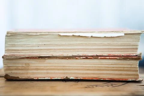 Stack of old books on light background, close up Stock Photos