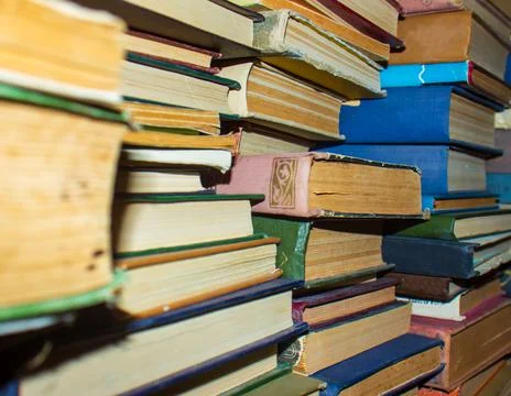 Stack of old books, pile of old books, old books wallpaper, book background Stock Photos