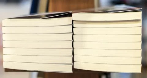 Stack of old books for sale in book stall Stock Photos