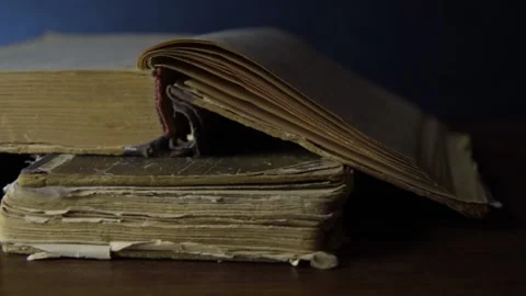 A stack of old books. Slow motion and close up Video stock 131965786