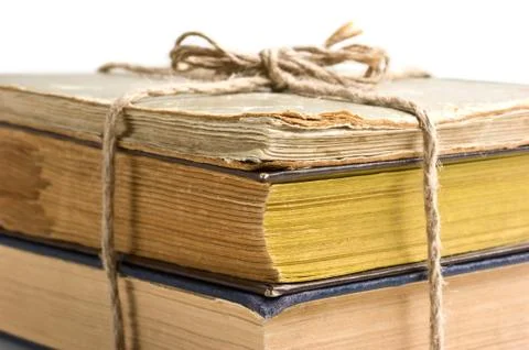 Stack of old books tied with rope 写真素材