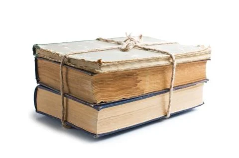 Stack of old books tied with rope 写真素材