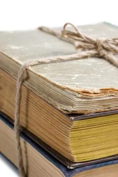 Stack of old books tied with rope 写真素材