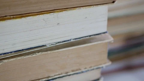 Stack of old books tilt shot Stock Footage 113099963