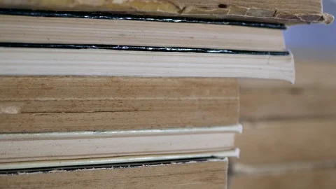 Stack of old books tilt shot. Stock Footage 113100045