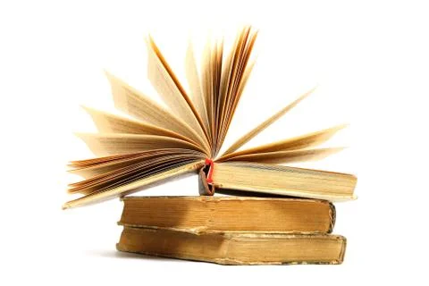 Stack of old books on a white background. Stock Photos