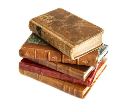 Stack of old books on white background Foto stock