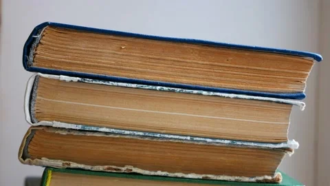 Stack of old books with yellow pages Stock Footage 152774085