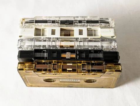 A stack of old cassettes with a white background 스톡 사진