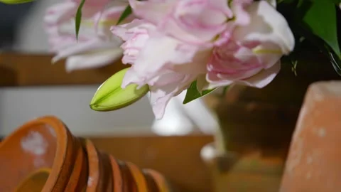 A stack of old, dirty pots sit on a table Stock-Footage 297774584