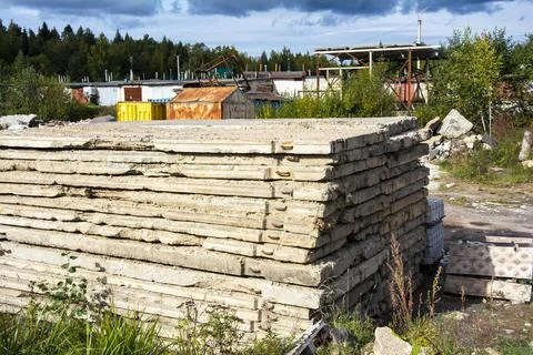 A stack of old dismantled concrete road slabs Stock Photos
