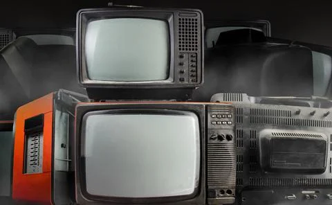 Stack of old fashioned tv sets. Stock Photos