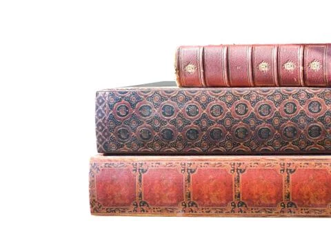 Stack of old leatherbound books isolated on white Stock Photos