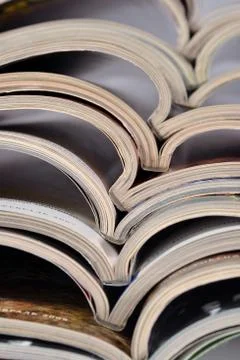 Stack of old magazines closeup Stock Photos