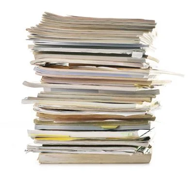 Stack of old magazines isolated on white. Paper recycling Stock Photos