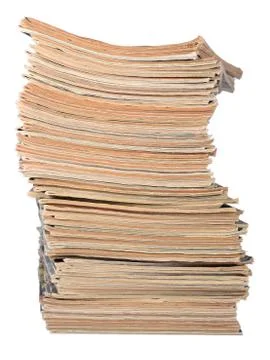 Stack of old magazines on a white background Stock Photos