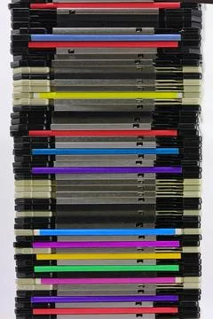 Stack of old magnetic floppy disks used to save data from the first persona.. Stock Photos