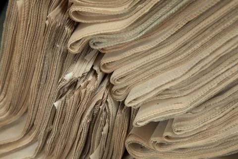 A stack of old newspapers. Stock Photos