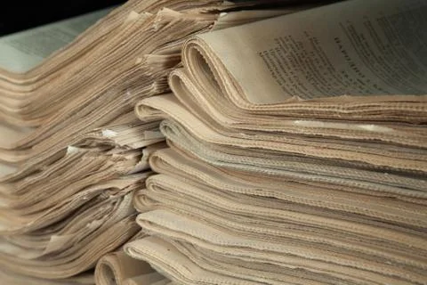 A stack of old newspapers. Stock Photos