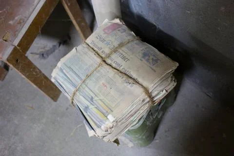 Stack of Old Newspapers Tied Together with Rope Stock Photos