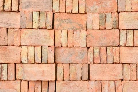 Stack of old orange bricks Fotos Stock