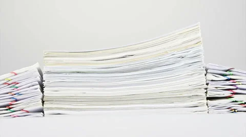 Stack old overload paperwork on table time lapse 動画素材 49648212