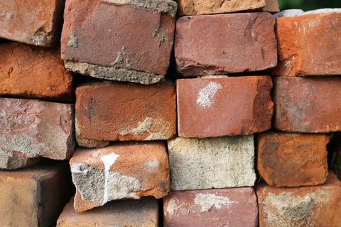 Stack of Old Red Clay Bricks and Mortar from A Salvaged Chimney Stock Photos