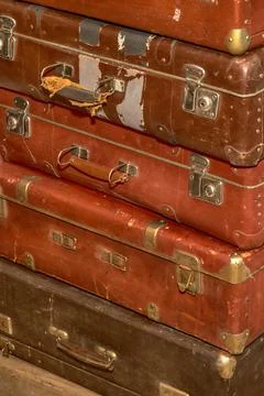 Stack of old retro suitcases close up Stock Photos