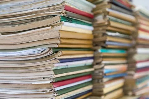 A stack of old school notebooks. Multicolored cover. Stock Photos